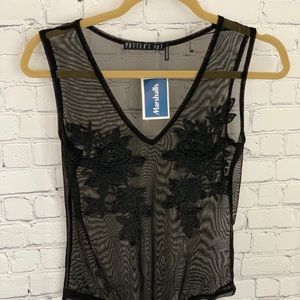 Sheer black bodysuit